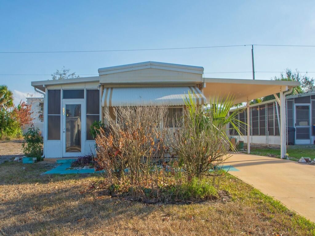 Photo of 335 NE Tropicalia Lane, Jensen Beach, FL 34957 (MLS # R11167408)