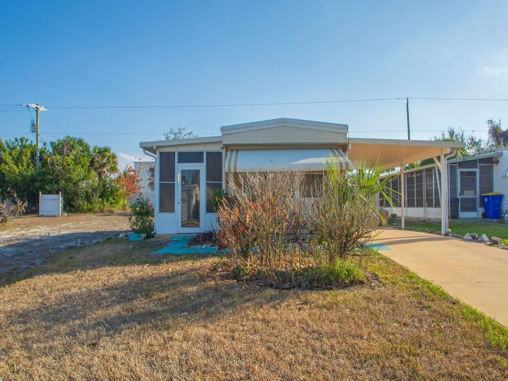 Photo of 335 NE Tropicalia Lane, Jensen Beach, FL 34957 (MLS # R11167408)