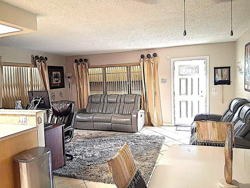 **FIRST FLOOR** UPDATED and SPACIOUS 1 BEDROOM 1 & a 1/2 baths END UNIT with an OPEN FLOORPLAN, CENTRAL A/C, Tile floors throughout, updated bathrooms & Kitchen. Screened Patio, Accordion Shutters, FREE Laundry (Washer & dryer), Community Pool, Clubhouse, Bus Service, And So Much More!! Call TODAY for a showing!