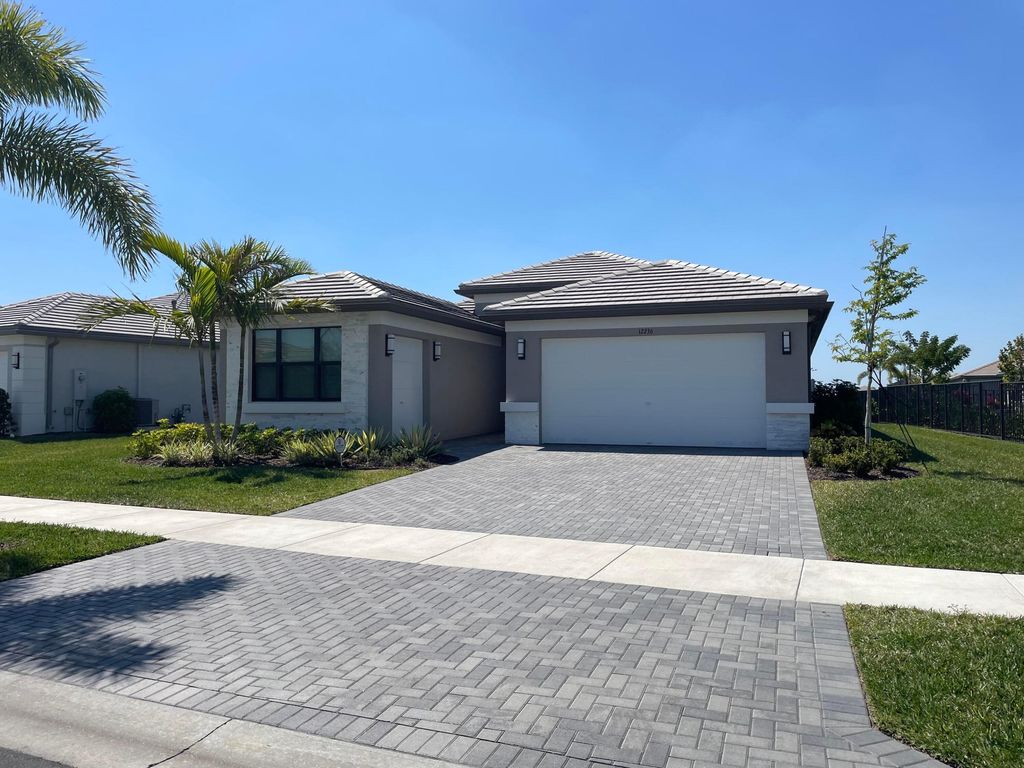 Photo of 12236 SW Tidal Shores Way, Port Saint Lucie, FL 34987 (MLS # B26025451)