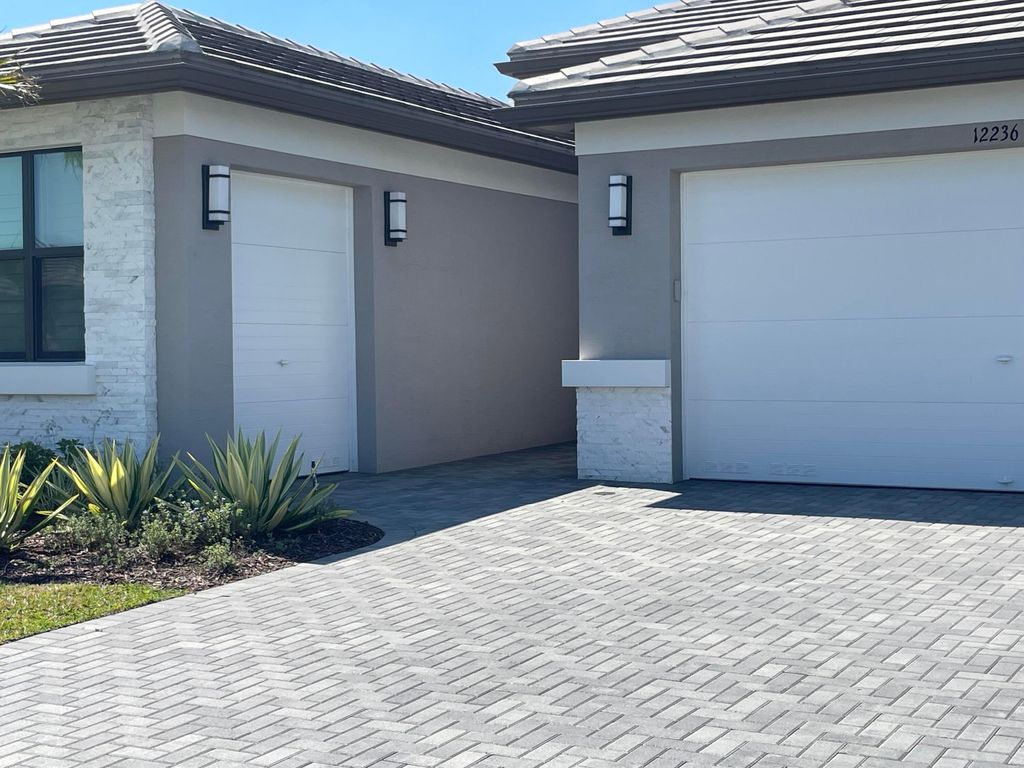 Photo of 12236 SW Tidal Shores Way, Port Saint Lucie, FL 34987 (MLS # B26025451)