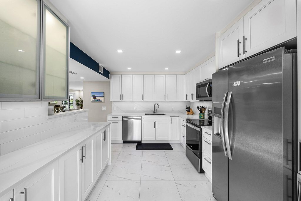 Photo of 3709 Quail Ridge Drive #Bobwhite B, Boynton Beach, FL 33436 (MLS # R11150489)