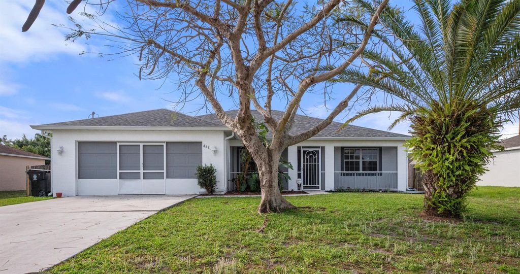 Photo of 452 SW Baoy Avenue, Port Saint Lucie, FL 34953 (MLS # R11079893)