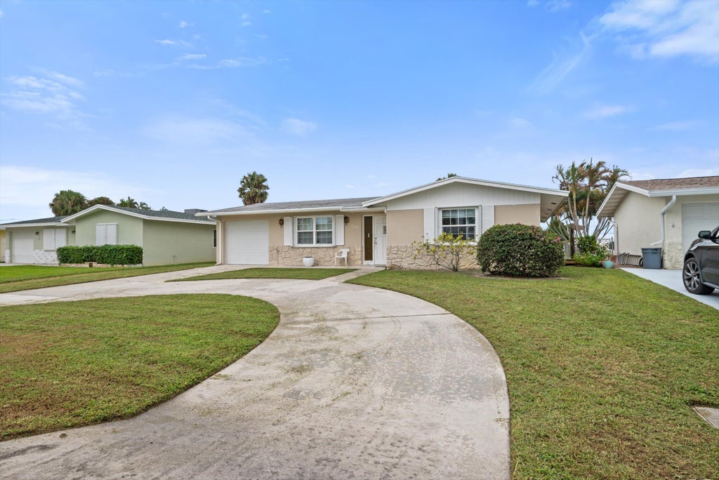 Photo of 400 Riverside Drive, Palm Beach Gardens, FL 33410 (MLS # R11035562)