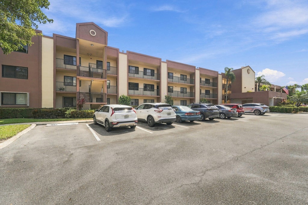 Photo of 10607 W CLAIRMONT Circle #109, Tamarac, FL 33321 (MLS # B26085809)
