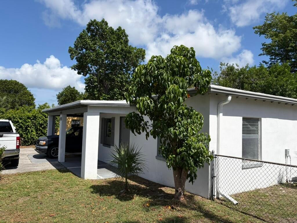 Photo of 1861 BOMAR Drive, Juno Beach, FL 33408 (MLS # B26086739)
