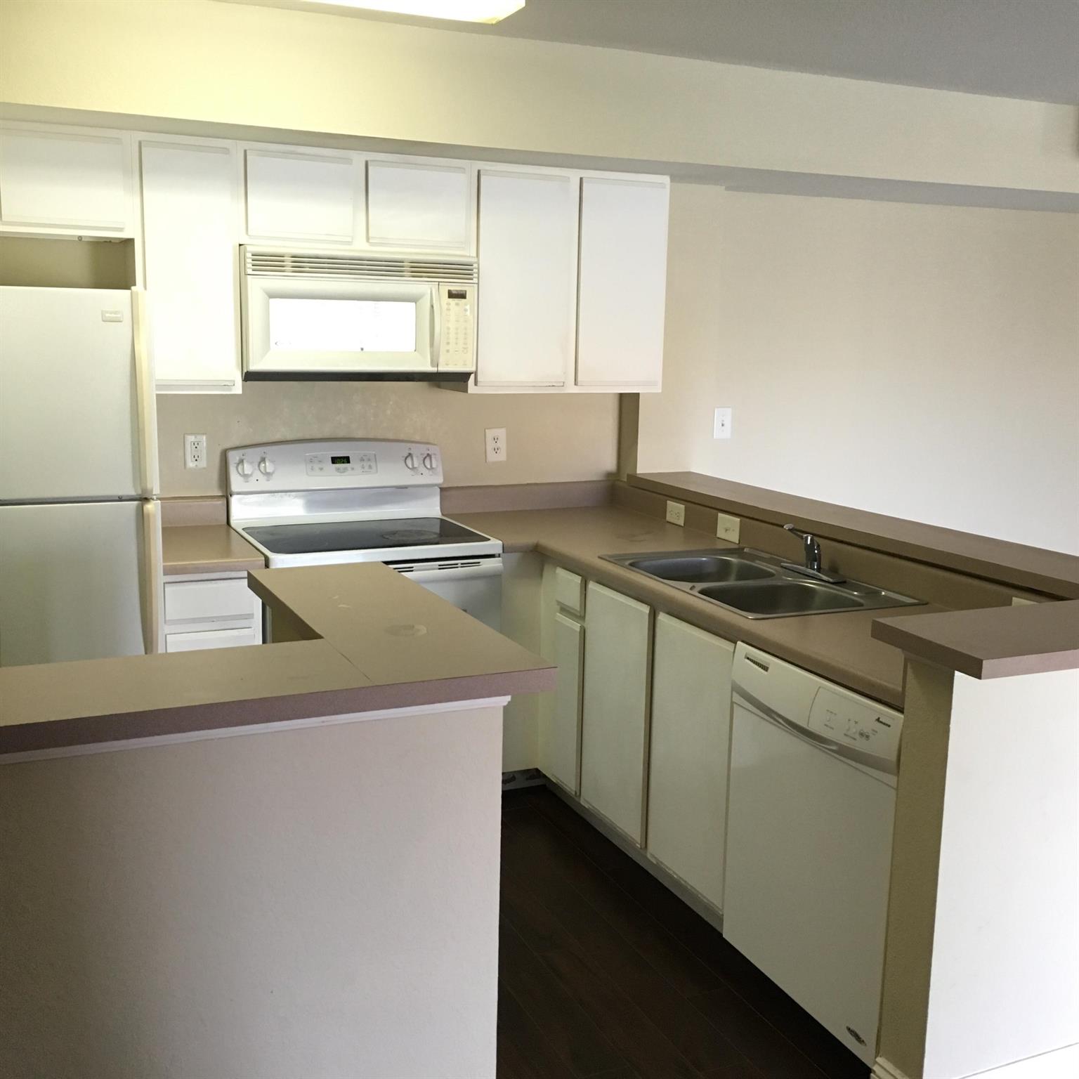 Move in ready! This 2/2 features wood laminated floor. Washer and Dryer in separate laundry room off kitchen. There is a separate locker storage room outside the front door. Unit will be professionally cleaned prior to final walk through. Unit is vacant and very easy to show. First, last and security required for move in. If you decide to apply, send proof of income, screenshot of credit score and copy of ID. Gated community with Clubhouse, pool, fitness center, picnic area and child playground. Must to see!!!