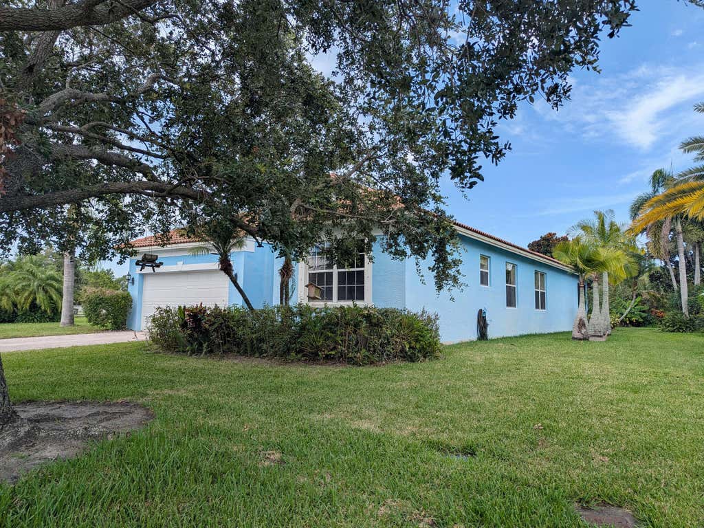 Photo of 2119 NW MARSH RABBIT Lane, Jensen Beach, FL 34957 (MLS # B26055661)