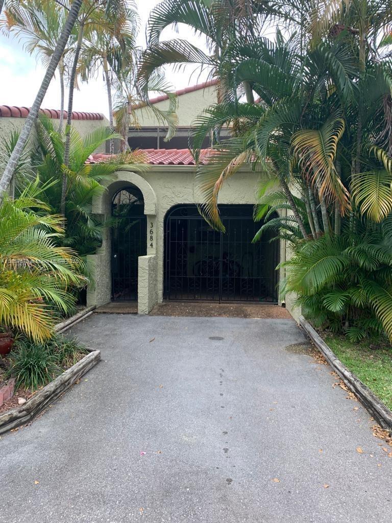 Beautiful 2-bedroom, 2-bath townhouse located in a desirable gated golf community! This charming two-story home features classic Spanish tile flooring, an updated kitchen with modern finishes, and a spa-like master bathroom designed for relaxation. Enjoy the convenience of a covered carport and the comfort of community living with access to golf, security, and more. Perfect for year-round living or a seasonal getaway!