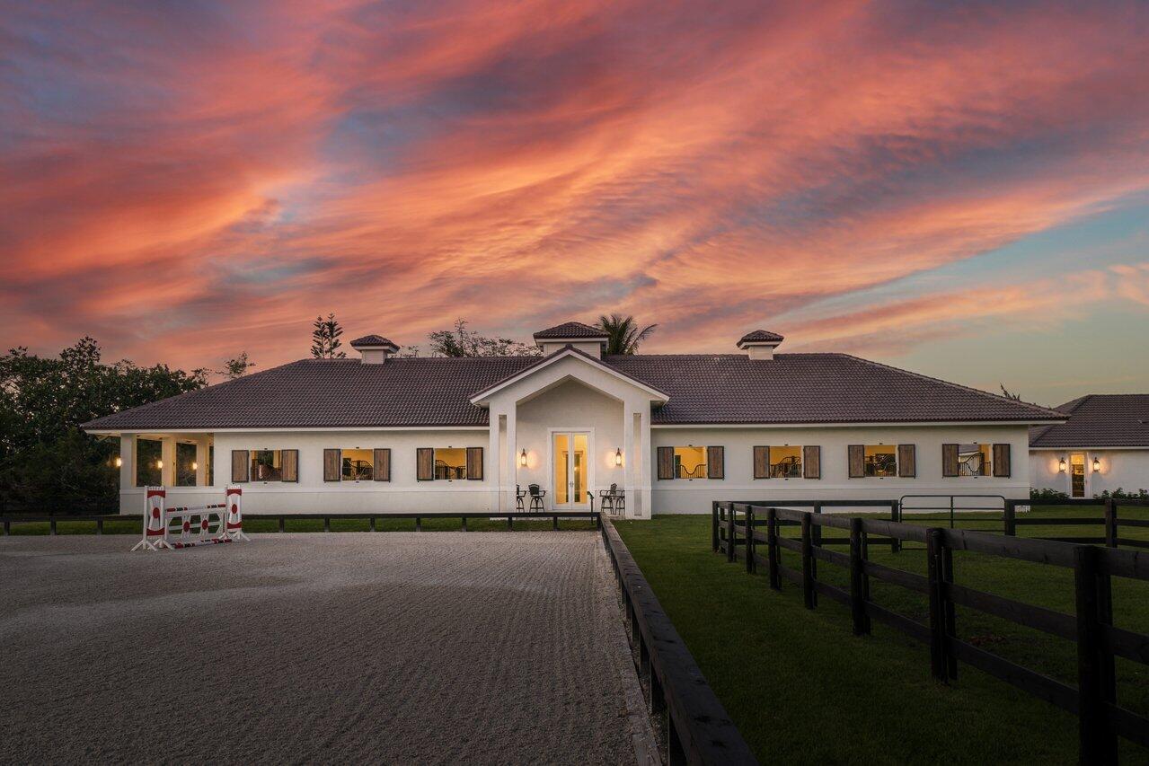 Spend your 2026 WEF season at this fantastic farm. 10 stalls at a 12 stall barn available. Barn and farm are done to the highest standards. If you need housing, this farm has 2 VERY high end apartments included. Plenty of room for feed, tack, hay etc. 4 wash/grooming stalls all with hot/cold water and mounted fans. Wi-fi throughout the farm and every stall has a camera the tenant can access 24/7. Lovely a/c riders lounge with a powder room that overlooks the 125 x 220 professional arena that never floods and has a brand new set of jumps. You will also have 4 GRASS paddocks for your exclusive use. Do not hesitate if you are searching for the perfect place to spend season.