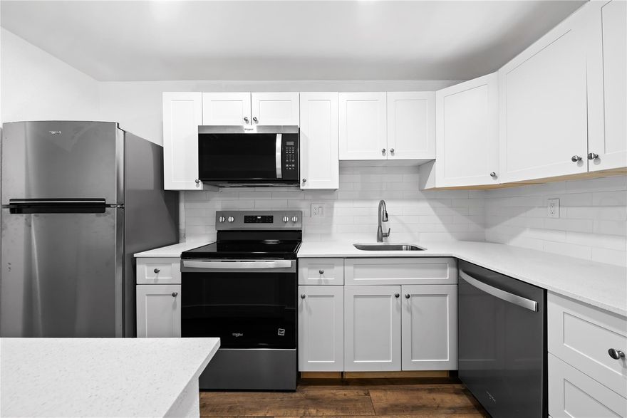 Beautifully updated condo with Stunning Lake Views! Only 7 minutes to the beach!!! Enjoy pristine water views from your private balcony in this light and bright condo. The new modern kitchen features white cabinetry, Quartz countertops and a stylish tile backsplash. Brand new stainless steel appliances. Freshly painted with new luxury vinyl flooring throughout, this home offers a move-in-ready feel. The spacious bathroom includes a step-in shower with a glass door. Relax on your open balcony off the primary bedroom overlooking the expansive lake and dock. Community features: All ages welcome and pets allowed.