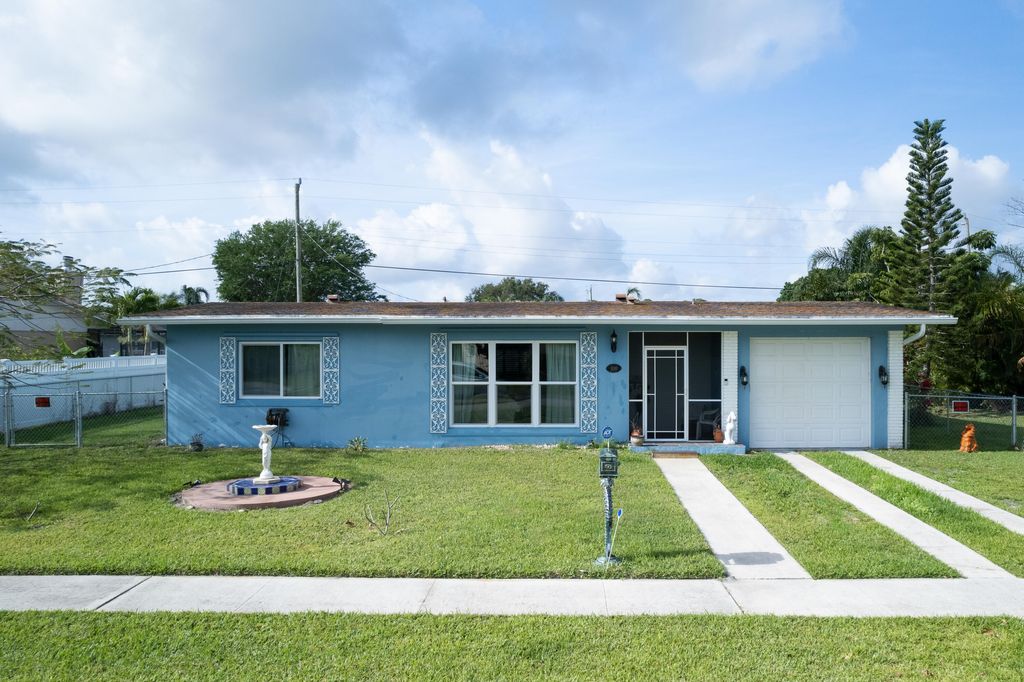 Photo of 1110 SE Mayfair Lane, Port Saint Lucie, FL 34952 (MLS # R10786262)