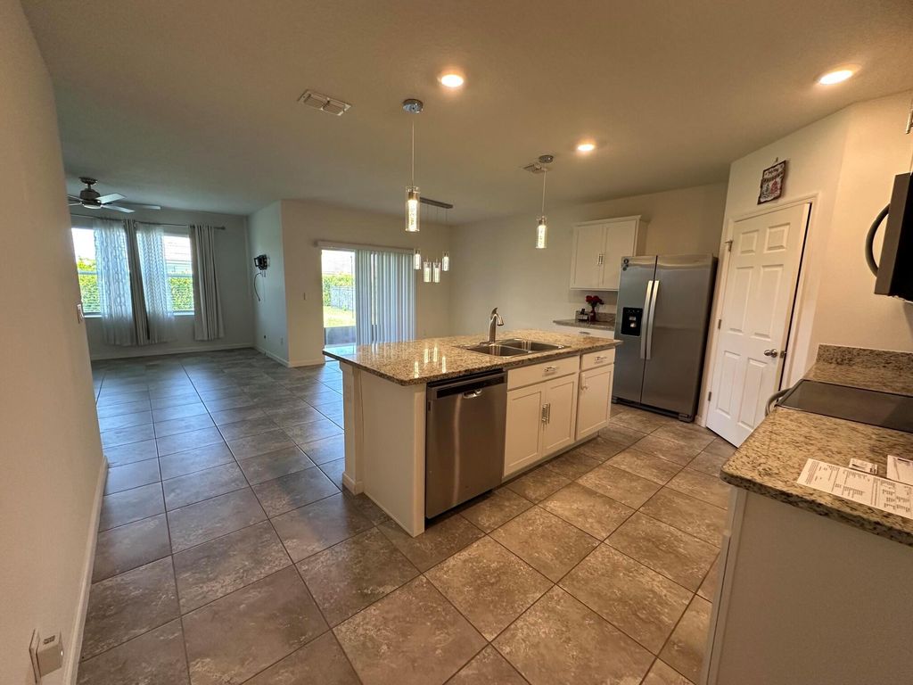 Photo of 10588 SW Toren Way, Port Saint Lucie, FL 34987 (MLS # R11067791)