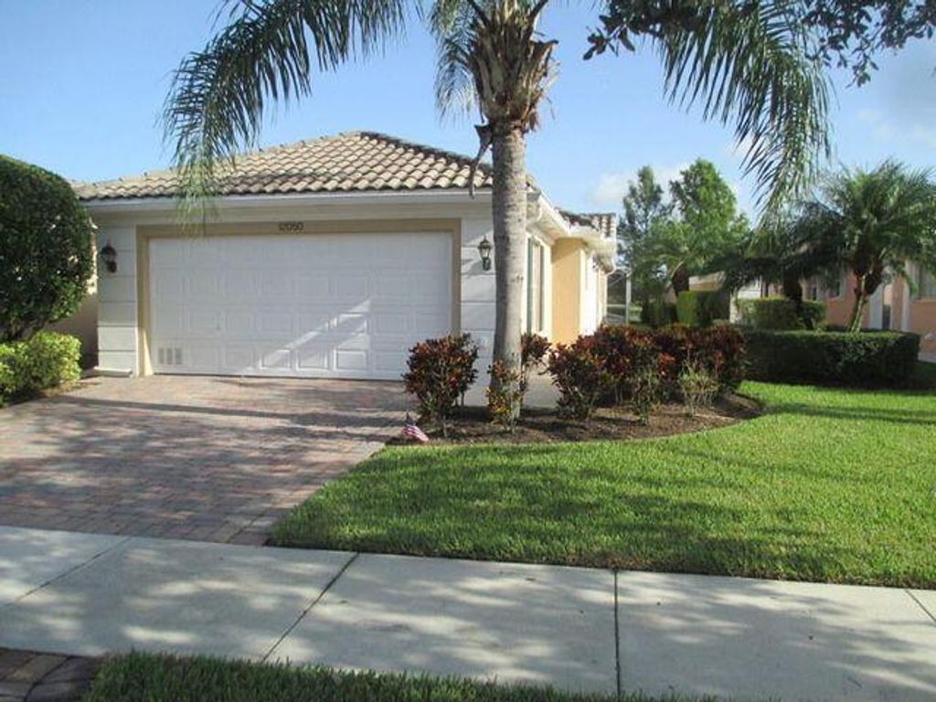 Photo of 12050 SW Elsinore Drive S, Port Saint Lucie, FL 34987 (MLS # R10751923)