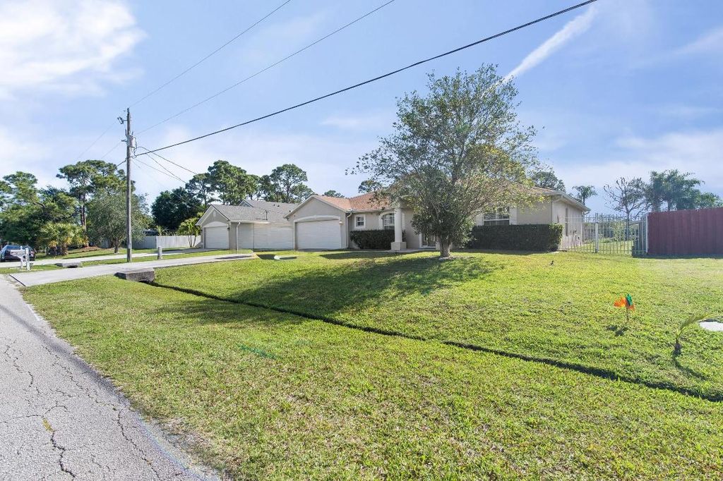 Photo of 663 NW North Macedo Boulevard, Port Saint Lucie, FL 34983 (MLS # R11081861)