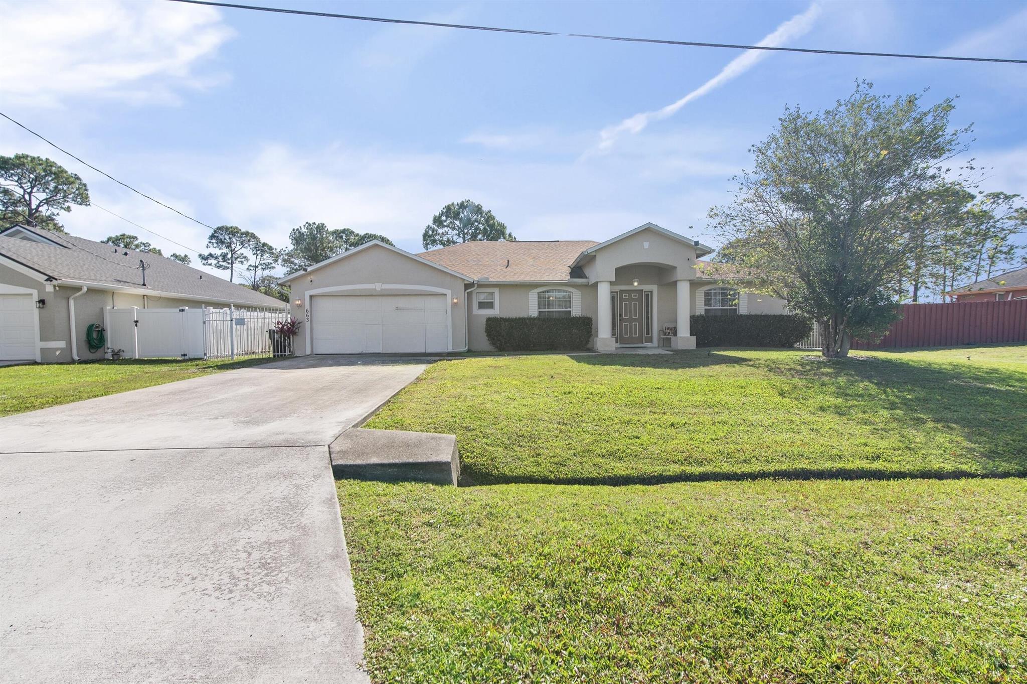 Large 3/2/2 CBS home located in a desirable location close to schools, shopping, I-95, and the Turnpike. The home features a screened lanai, fenced yard, two separate living areas, tile throughout with laminate flooring in the bedrooms, granite counter tops, tons of kitchen cabinets, and more. This home includes solar panels, which will be paid off at closing. Schedule your private showing today.