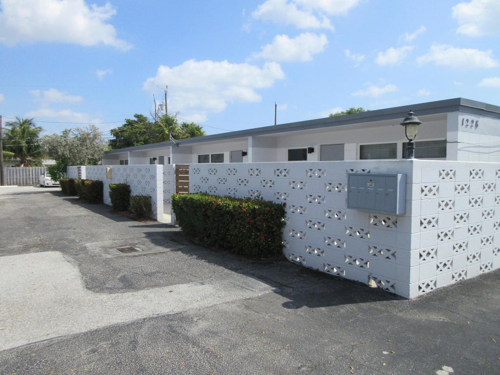 Photo of 1230 18th Avenue N, Lake Worth Beach, FL 33460 (MLS # R11012054)