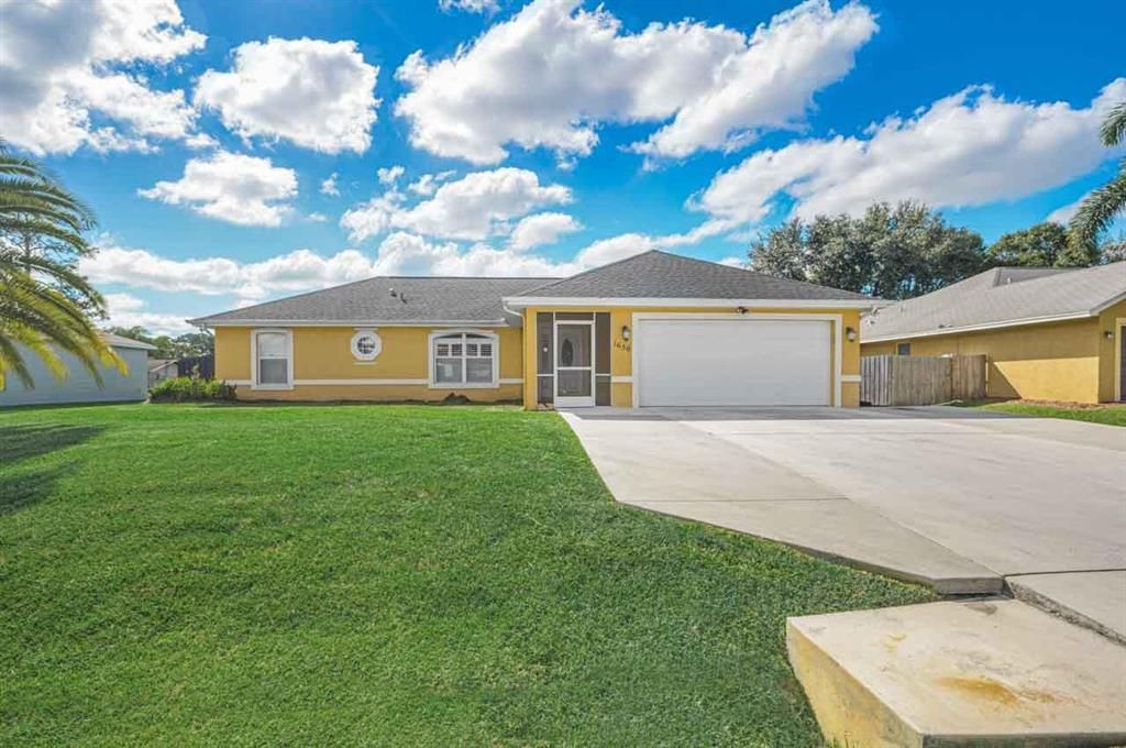 Photo of 1650 SW Janette Avenue, Port St Lucie, FL 34953 (MLS # R10842168)