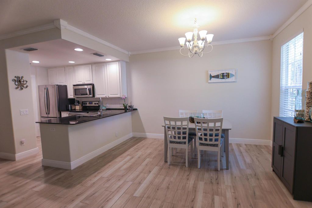 Photo of 266 Iris Drive, Jupiter, FL 33458 (MLS # R11109239)