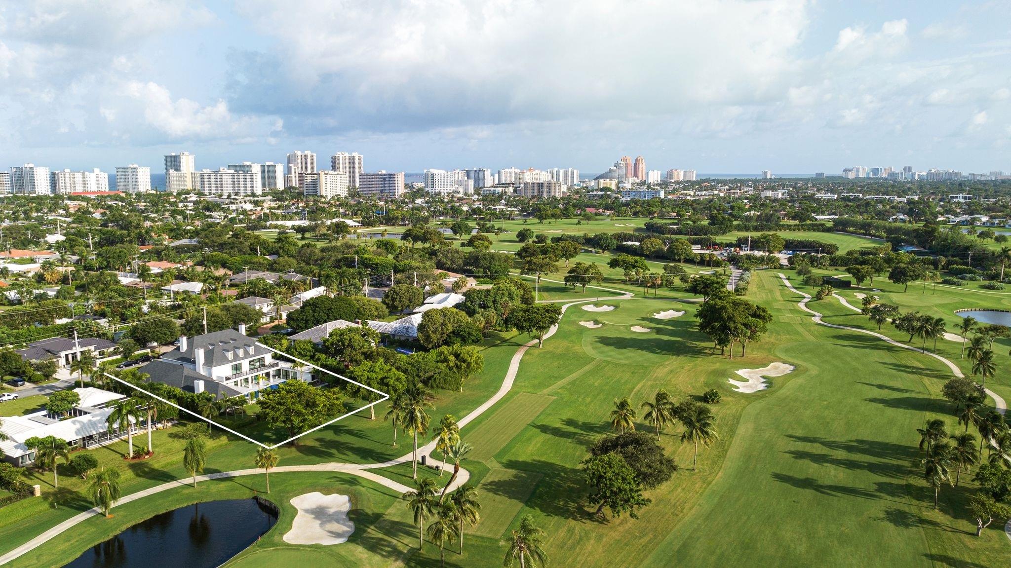 Owner Financing Available At Below Market Rates. Welcome to the most spectacular golf course view home in Coral Ridge Country Club which has been meticulously renovated and is worthy of an interior design magazine cover. This exquisitely designed estate features 11,300 sq/ft of interior space and a breathtaking 1,520 sq/ft of covered outside living space overlooking the 8th hole. With a total of 7 bedrooms, 7.5 bathrooms and a 6 car air-conditioned garage, no expense has been spared designing the expansive interiors. Elevator, custom bar, sauna, wood & marble floors, a chef's kitchen, gas appliances and full house generator. The summer kitchen overlooking the oversized resort style pool area and golf course has vaulted ceilings, a fire place, bbq, gas cooktops and an expansive living area.