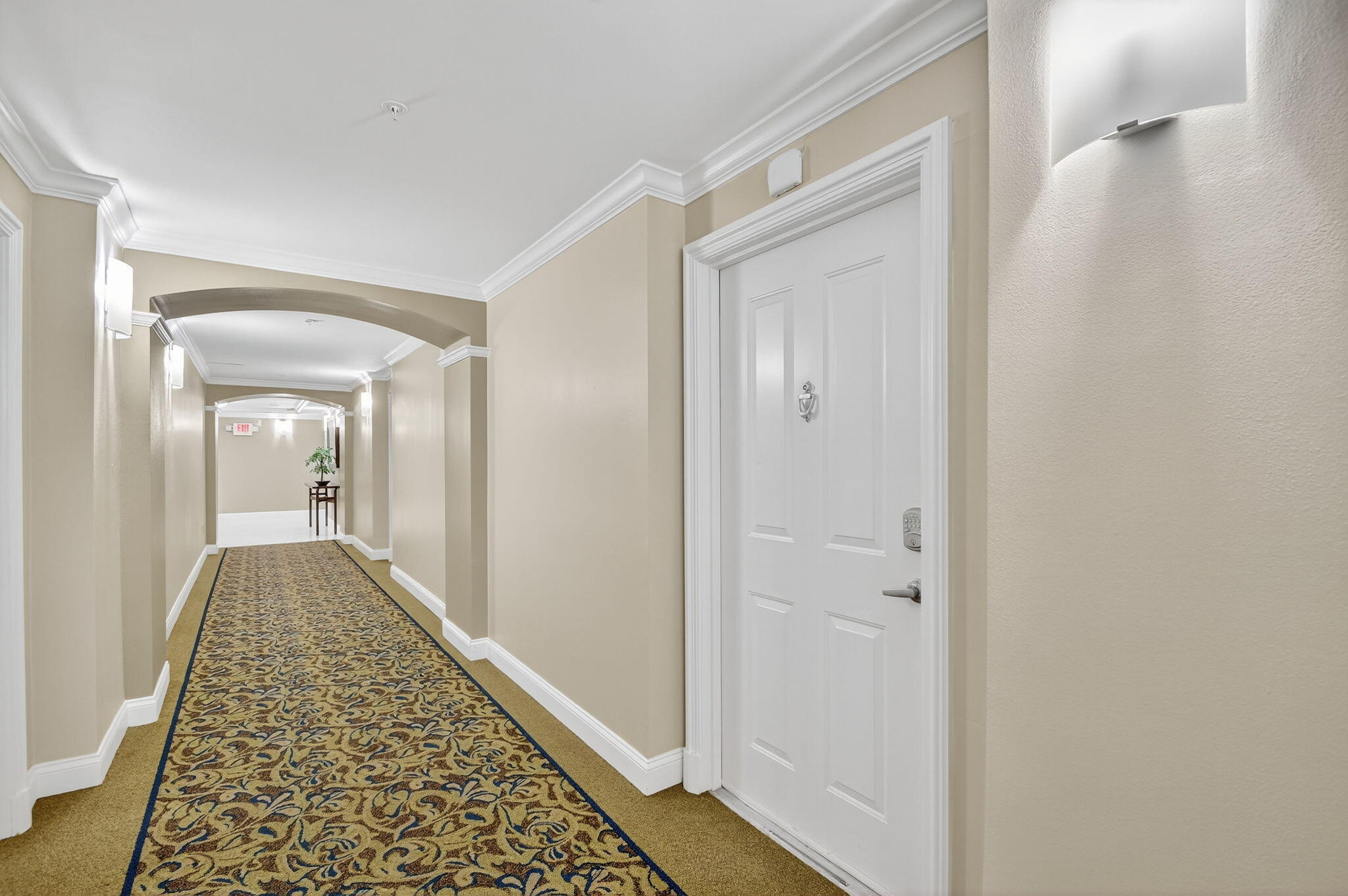 Available annually unfurnished or furnished. Welcome to this beautifully updated corner unit condominium where comfort meets style. Located in a desirable downtown West Palm Beach building, this residence offers a serene garden-facing view and a host of modern upgrades. Featuring stylish waterproof vinyl flooring throughout the kitchen, living, dining, and bathroom areas, combining durability with modern appeal. The kitchen is equipped with a newer refrigerator, and the convenience of in-unit full size laundry adds to functionality. The bathroom has been thoughtfully updated with a refinished shower and tub, complemented by an updated vanity and mirror that bring a fresh, contemporary feel.As a corner unit, natural light fills the space, enhancing its open and airy ambiance.