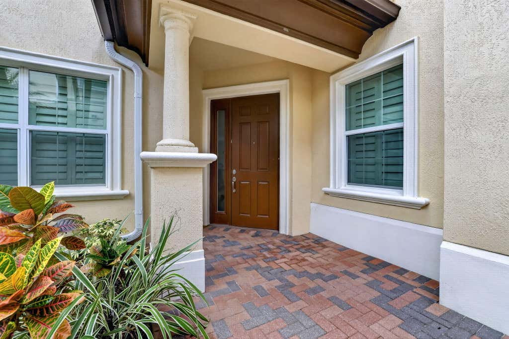 Photo of 127 Tresana Boulevard #61, Jupiter, FL 33478 (MLS # B26067910)