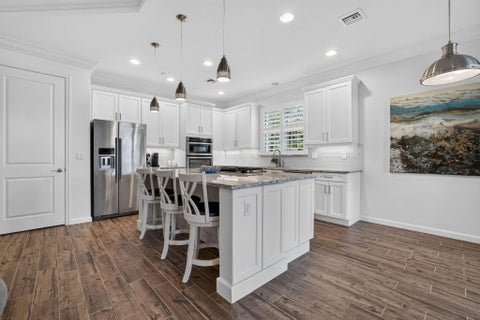 Photo of 127 Tresana Boulevard #61, Jupiter, FL 33478 (MLS # B26067910)