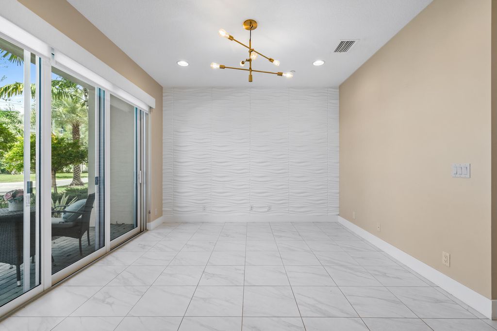Photo of 4133 Faraday Way, Palm Beach Gardens, FL 33418 (MLS # R11023236)