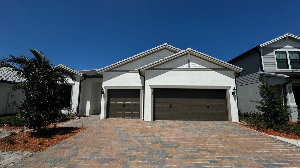 Photo of 853 SE Courances Drive, Port Saint Lucie, FL 34984 (MLS # R11000222)