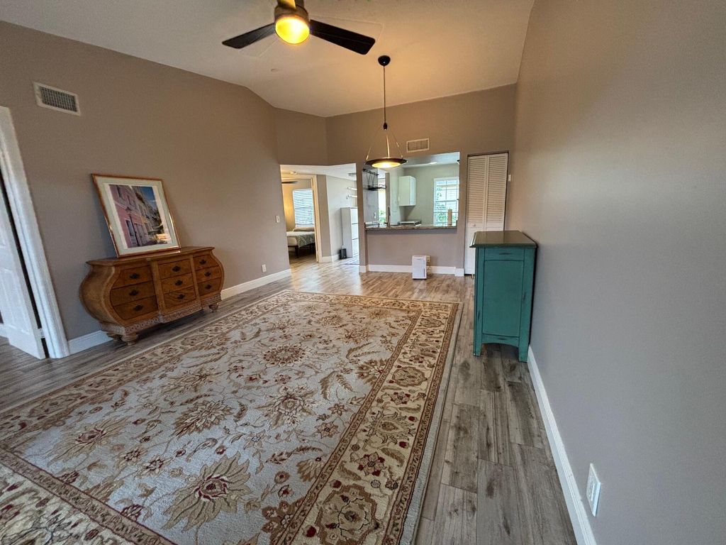 Photo of 1035 Lake Shore Drive #202, Lake Park, FL 33403 (MLS # R11159157)