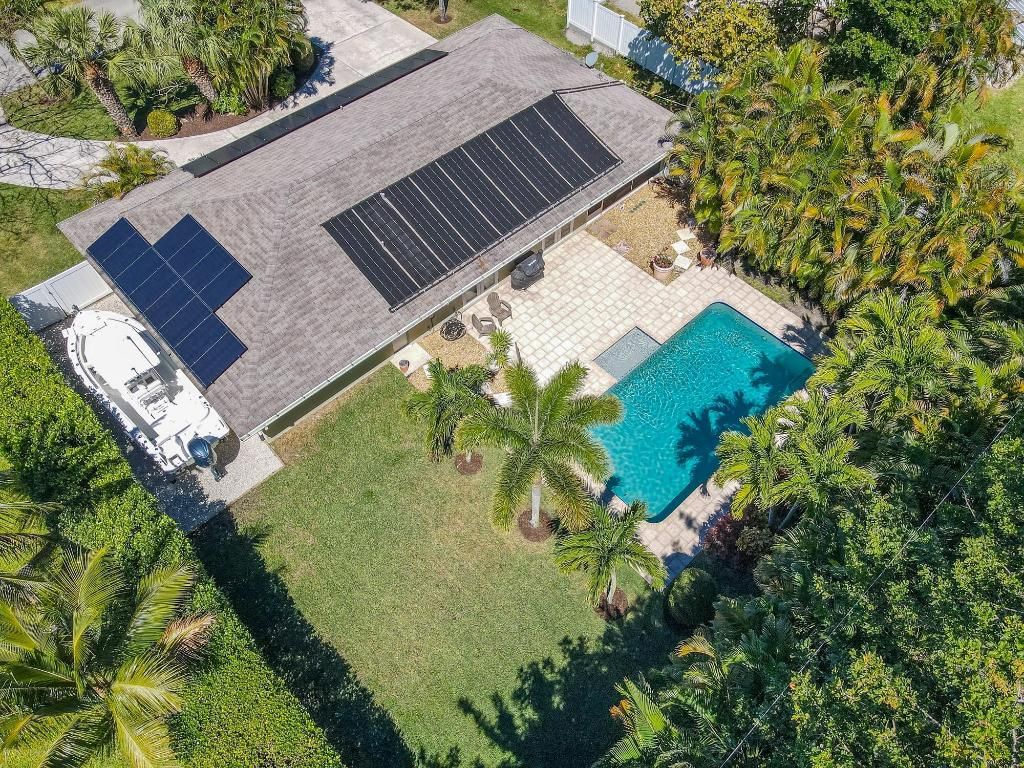 Photo of 5116 Laird Lane, Jupiter, FL 33458 (MLS # R11073533)