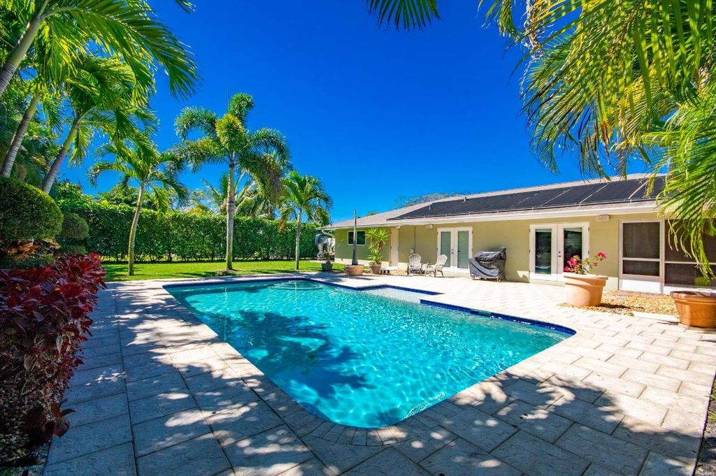 Photo of 5116 Laird Lane, Jupiter, FL 33458 (MLS # R11073533)