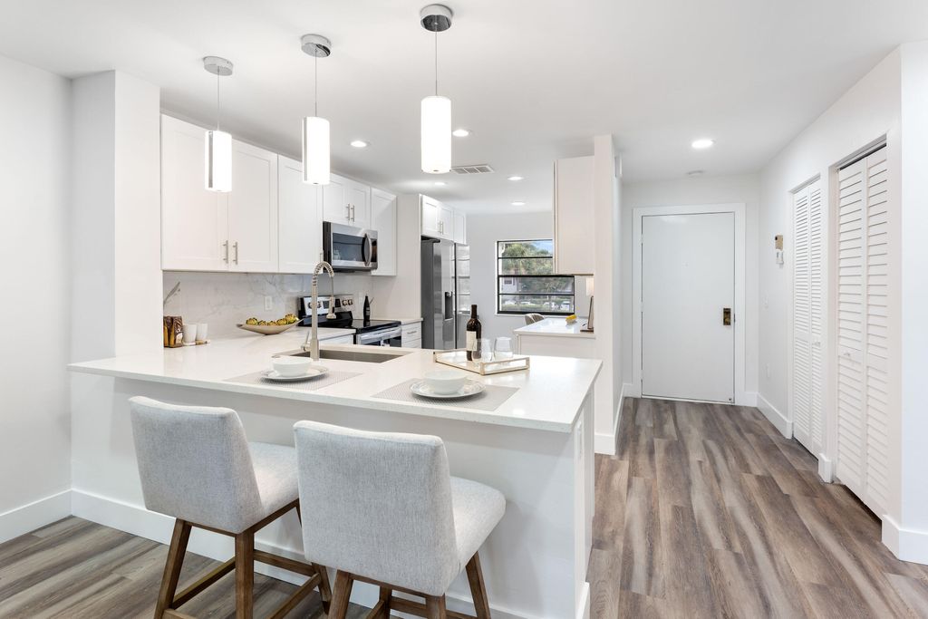 Photo of 30 Southport Lane #D, Boynton Beach, FL 33436 (MLS # R10967488)