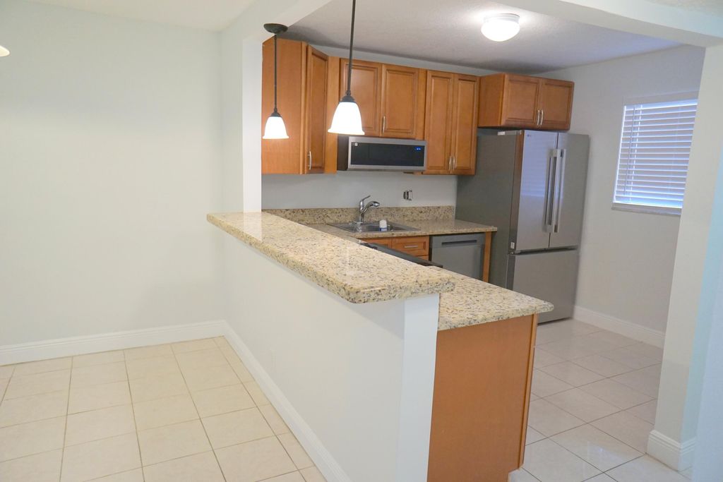 Photo of 1891 SW 81st Avenue #202, North Lauderdale, FL 33068 (MLS # B26017189)