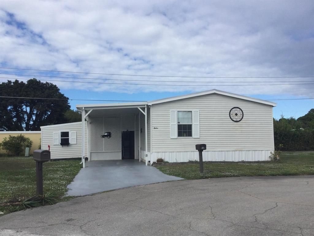 Photo of 12 SE Margarita Lane, Port Saint Lucie, FL 34952 (MLS # R10756321)