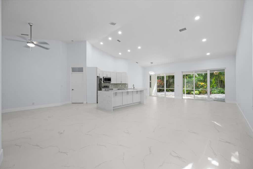 Photo of 4521 CARLTON GOLF Drive, Lake Worth, FL 33449 (MLS # B26055401)
