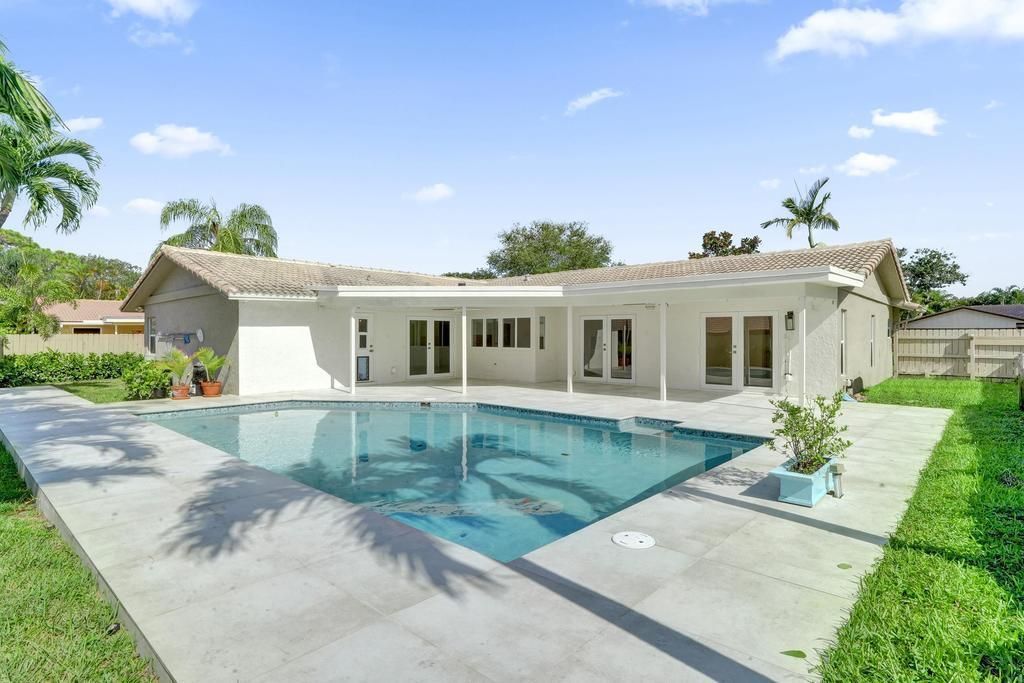 Photo of 2382 NW 31st Street, Boca Raton, FL 33431 (MLS # R11119472)