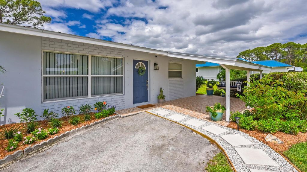 Photo of 3216 SW Areca Drive, Palm City, FL 34990 (MLS # R11080925)