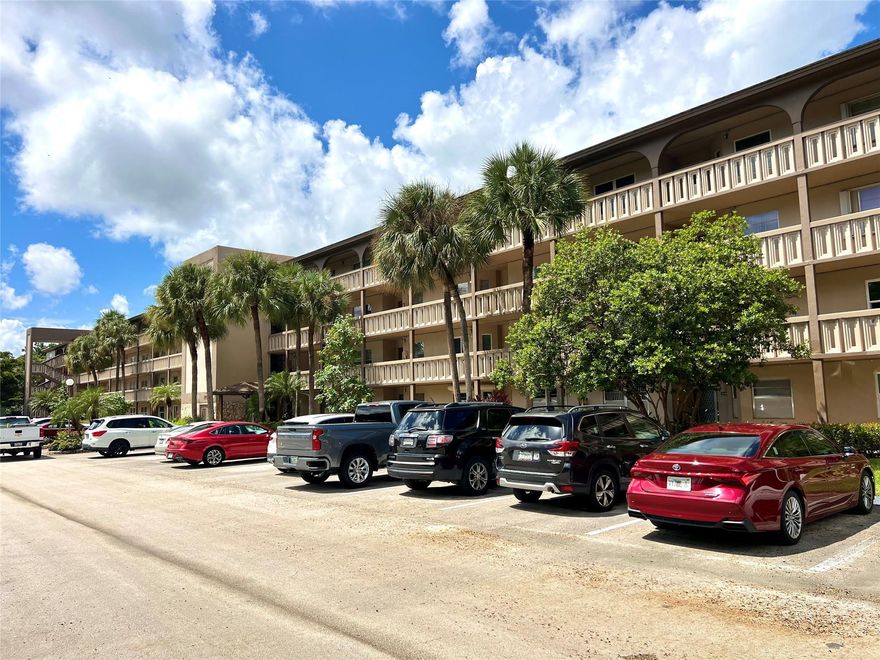 Another Amazingly Spacious, updated 2 Bed, 2 Bath Corner Beauty! Enjoy resort-style living in this beautifully updated first-floor corner unit with a stunning pool view! Updated with crown moldings, textured walls & artistic ceiling, Laminate floors throughout, Eat-in kitchen + washer & dryer in unit, Partially furnished, enclosed screened patio with pool view, move right in! Gated community with 24/7 security & Loads of amenities — pool, clubhouse, fitness center & more! Don’t miss this rare find — comfort, style, and convenience all in one!