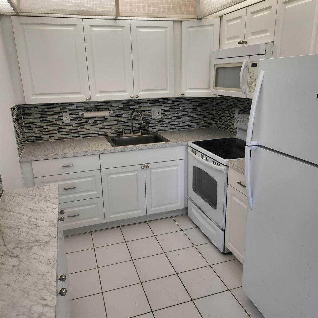 Photo of 106 Coventry E #106, West Palm Beach, FL 33417 (MLS # R11134580)