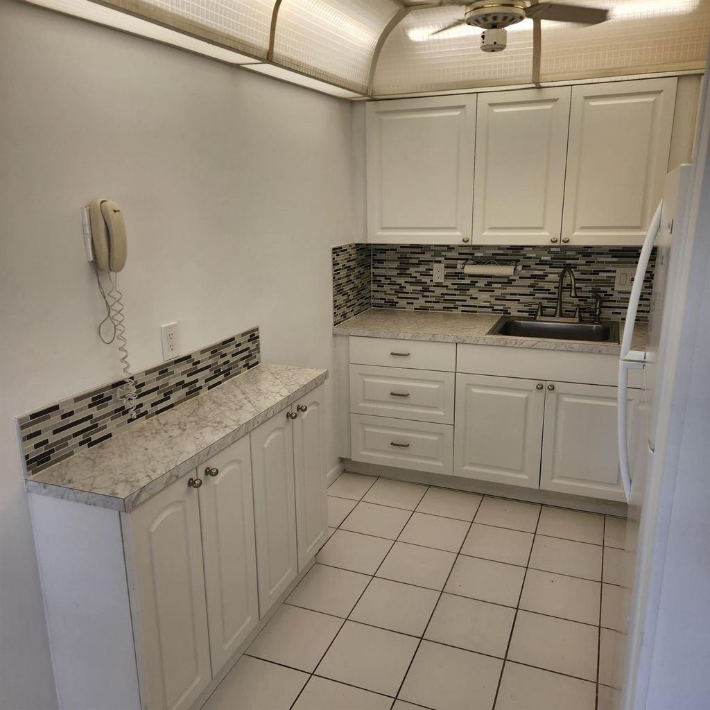Photo of 106 Coventry E #106, West Palm Beach, FL 33417 (MLS # R11134580)