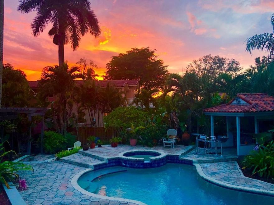 Nestled in the prestigious Davie Area, this exquisite 4-bedroom, 5-bathroom estate fully remodeled in 2002 & meticulously.   maintained, this 3,923 sq ft. with 1.25 acres of land surrendered by privacy lake and beautiful homes. Step inside to an open-concept layout flooded with natural light, featuring marble flooring throughout, wood in bedrooms, fireplace in the family room, large kitchen, stainless steel appliances, granite countertops. The master suite is large 1,200 sq ft,  jacuzzi,  sauna, private office and large closets. Direct access to the balcony overlooking the lake. Upstairs, 3 comfortable bed 2 full baths, maids room, playroom, or office for business a separate entrance, endless potential for a home business, pool bar, gym or studio, private pool & spa. No HOA  4 car garage