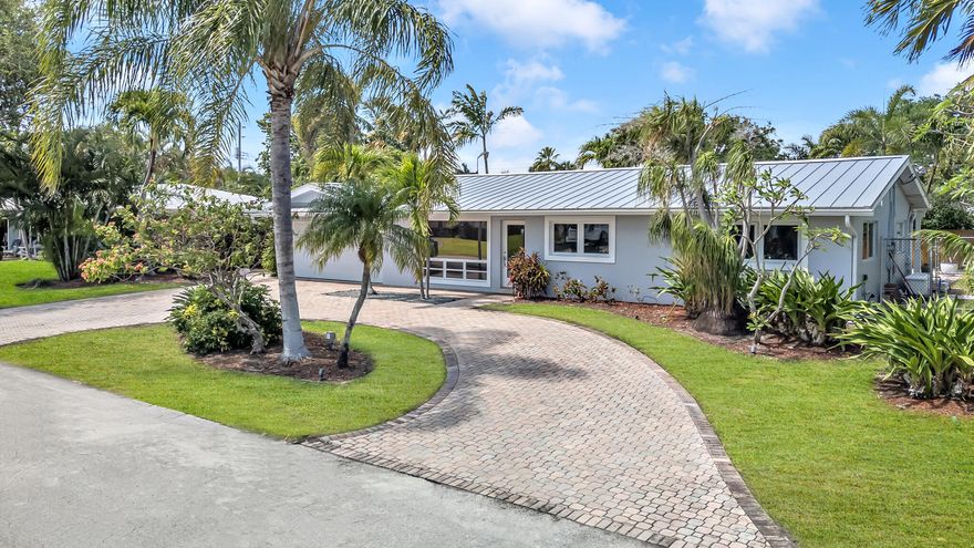 Well maintained and move in ready, this 4 bedroom, 3 bathroom 2,424 SQ FT home offers the ideal blend of comfort, quality upgrades, and true South Florida coastal living. Featuring a brand-new roof (2025) by Palm Beach Roof Tops and impact sliding glass doors and impact 2 car garage door. The layout flows effortlessly for living and entertaining, highlighted by a beautifully remodeled kitchen with brand new quartz countertops. Enjoy seamless indoor outdoor living with cabana access that opens directly to a private pool and tropical backyard, one of the most sought after features for buyers in Lighthouse Point. The lush landscaping is maintained by a 4 zone automatic sprinkler system, keeping the property vibrant year round. Additional upgrades include plumbing improvements 2025, adding long-term value and confidence for future homeowners. This is a fantastic opportunity to own a well cared for home in one of South Florida's most desirable coastal communities, just minutes from beaches, marinas, dining, and shopping.