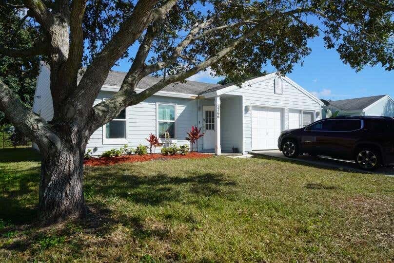 Photo of 5266 HARWOOD Lane, Lake Worth, FL 33467 (MLS # B26063066)