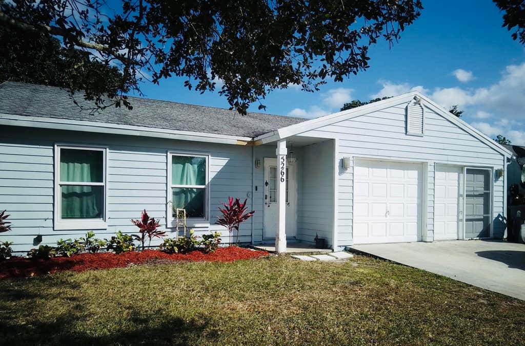 Photo of 5266 HARWOOD Lane, Lake Worth, FL 33467 (MLS # B26063066)