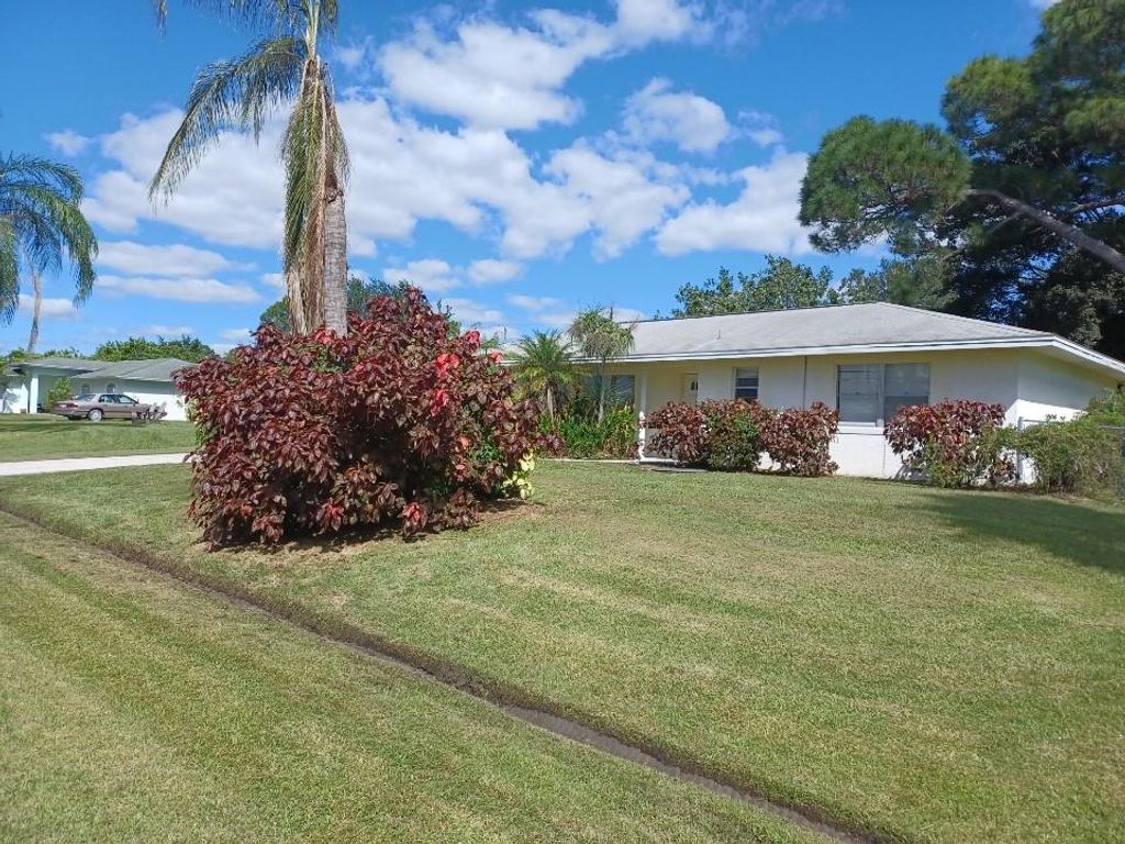 Photo of 149 SW Evans Ave, Port Saint Lucie, FL 34984 (MLS # F10300888)