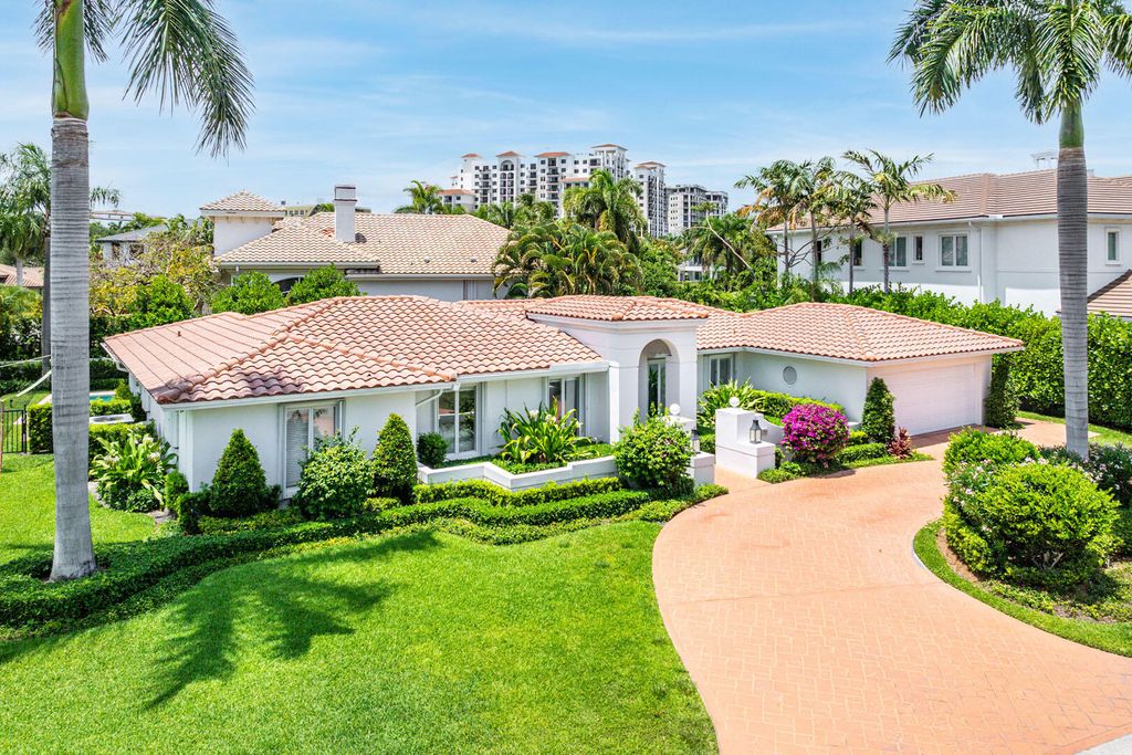 Photo of 1251 Thatch Palm Drive, Boca Raton, FL 33432 (MLS # B26027849)