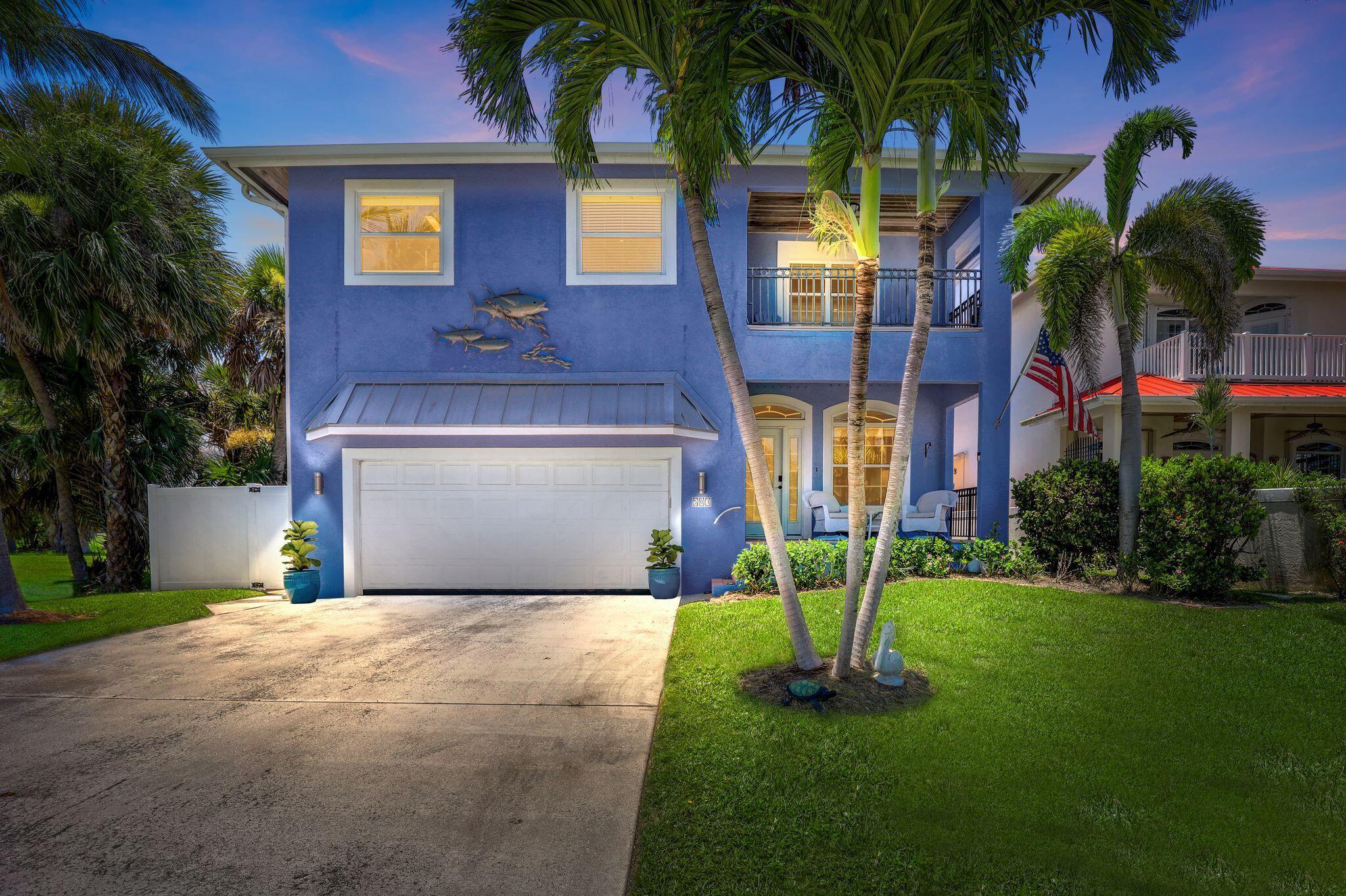 Location, location! Just steps from the beach, restaurants, bars and the famous Fort Pierce Inlet. Unique Key West style home, with 3 covered balconies, Island views and many custom smart features. Enter into a separate living area which opens into a large great room with soaring 20 ft ceilings. Two primary bedrooms, one downstairs with its own private En Suite with a walk out to the tropical garden, and one upstairs with its own separate living area, a private balcony that faces the ocean, a huge walk in closet and private En Suite. An upstairs guest bedroom with a separate bath, and another large balcony that views the tropical backyard. Entertain many friends in the open great room, kitchen and dinning area. A chefs kitchen with, a oversized butlers pantry for abundant storage for