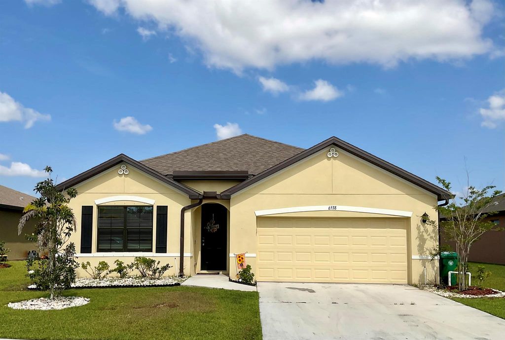 Photo of 6538 NW Oaklawn Way, Port Saint Lucie, FL 34983 (MLS # R10981453)