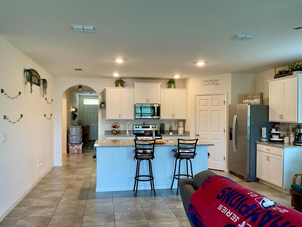 Photo of 6538 NW Oaklawn Way, Port Saint Lucie, FL 34983 (MLS # R10981453)